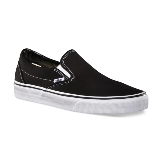 Vans classic slip top on black monochromatic shoes